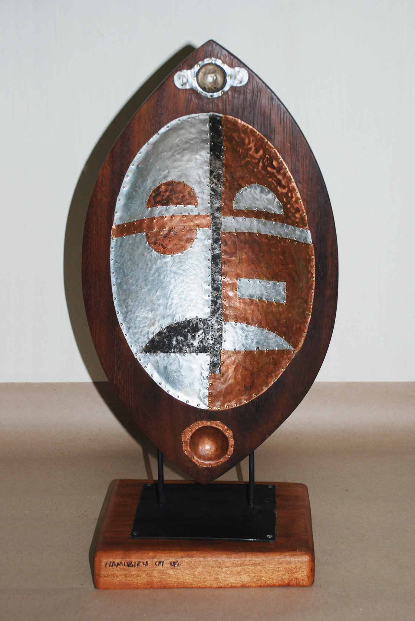 Wood and Metal shield sculpture by African artist